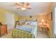 Bedroom features a ceiling fan and side table with a light next to the bed at 305 Goddard Ln., Murrells Inlet, SC 29576