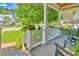 Relaxing front porch with rocking chairs and a view of the lush green neighborhood at 305 Goddard Ln., Murrells Inlet, SC 29576
