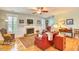Comfortable living room featuring a fireplace, hardwood floors, and stylish furnishings at 305 Goddard Ln., Murrells Inlet, SC 29576