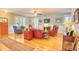 Inviting living room with fireplace, hardwood floors, and comfortable seating arrangement at 305 Goddard Ln., Murrells Inlet, SC 29576