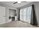 Bedroom with a built-in desk, ceiling fan, neutral carpet and plenty of natural light at 3173 Long Avenue Ext., Conway, SC 29526