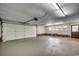 Spacious garage with painted floor, brick base and a work table at 3173 Long Avenue Ext., Conway, SC 29526