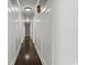 Hallway featuring wood floors, white paneled walls and recessed lighting at 3173 Long Avenue Ext., Conway, SC 29526