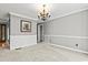 Open living area featuring chandelier and direct access to other rooms in the home at 3173 Long Avenue Ext., Conway, SC 29526