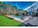 Inviting backyard pool with lounge area and patio, perfect for outdoor relaxation and entertaining at 3173 Long Avenue Ext., Conway, SC 29526