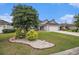 Charming home with well-maintained front yard and a beautiful landscaped flower bed at 325 Galway Ct., Longs, SC 29568