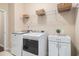 Well-lit laundry room with modern machines and plenty of storage space at 325 Galway Ct., Longs, SC 29568