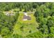 Aerial view of a large home on a vast property surrounded by lush greenery at 3995 Tillmond Dr., Conway, SC 29526