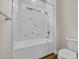 Bathroom with white tile, tub, shower and natural light at 3995 Tillmond Dr., Conway, SC 29526