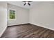 Bedroom with hardwood floors, a ceiling fan and a window with natural light at 3995 Tillmond Dr., Conway, SC 29526