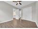 Large bedroom featuring wood look floors with ensuite bathroom at 3995 Tillmond Dr., Conway, SC 29526