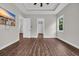 Bedroom with wood floors, neutral walls, and multiple entryways at 3995 Tillmond Dr., Conway, SC 29526
