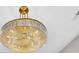 Close up of a stunning chandelier fixture in neutral room of an elegant home at 3995 Tillmond Dr., Conway, SC 29526