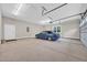 Spacious garage with a blue convertible car parked inside at 3995 Tillmond Dr., Conway, SC 29526