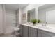 Bright bathroom with double vanity, shower and bath at 406 Glade Ct., Loris, SC 29569