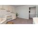 Bedroom with crib, chair, and decor and view of doorway to hall at 406 Glade Ct., Loris, SC 29569