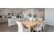 Modern kitchen with gray cabinets, stainless steel appliances, and a dining area at 406 Glade Ct., Loris, SC 29569