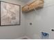 Functional laundry area with neutral walls and minimalist decor at 406 Glade Ct., Loris, SC 29569