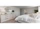 Bright main bedroom with plush carpeting, large windows, and neutral decor at 406 Glade Ct., Loris, SC 29569