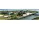 Beautiful aerial view of community amenities, featuring a pool, clubhouse, and beachfront access, with walkways and greenery at 415 Ocean Creek Dr. # 2161, Myrtle Beach, SC 29572