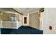 Condo entrance to unit 261, featuring a white door and small outdoor porch at 415 Ocean Creek Dr. # 2161, Myrtle Beach, SC 29572