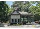 Entrance gate with American flag, providing a secure and welcoming entrance to the community at 415 Ocean Creek Dr. # 2161, Myrtle Beach, SC 29572