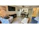 Inviting living room with modern decor, a flat-screen TV, and comfortable seating, perfect for relaxing or entertaining at 415 Ocean Creek Dr. # 2161, Myrtle Beach, SC 29572