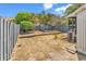 The expansive backyard, enclosed by a privacy fence, features bordered landscaping and an air conditioning unit at 4339 Baldwin Ave. # 4339, Little River, SC 29566