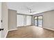 Bright bedroom features a ceiling fan, wood floors, closet and sliding glass door to the backyard at 4339 Baldwin Ave. # 4339, Little River, SC 29566