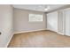 Bright bedroom features a ceiling fan, closet and window overlooking the backyard at 4339 Baldwin Ave. # 4339, Little River, SC 29566