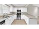 Stylish kitchen boasts granite counters, stainless appliances, and ample cabinet space at 4339 Baldwin Ave. # 4339, Little River, SC 29566