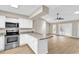 Kitchen with granite countertops, stainless appliances and views to the living room at 4339 Baldwin Ave. # 4339, Little River, SC 29566