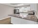 A kitchen with granite counters and stainless appliances in an open concept home at 4339 Baldwin Ave. # 4339, Little River, SC 29566
