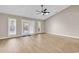 Spacious living room with wood floors, vaulted ceilings and abundant natural light from windows at 4339 Baldwin Ave. # 4339, Little River, SC 29566