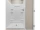 This shower features new tiling and built-in shelving at 4339 Baldwin Ave. # 4339, Little River, SC 29566