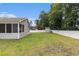 Large backyard with a white fence, offering ample space and privacy at 436 Cotton Grass Dr., Loris, SC 29569