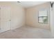 Empty bedroom with a blank wall, a closet, and natural light at 436 Cotton Grass Dr., Loris, SC 29569