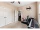 Simple bedroom with two closets, a ceiling fan, and natural light at 436 Cotton Grass Dr., Loris, SC 29569