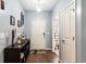 Inviting entryway with hardwood floors and a decorative console table at 436 Cotton Grass Dr., Loris, SC 29569
