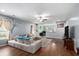 Spacious living room featuring wood floors, a comfortable sectional, and an open layout at 436 Cotton Grass Dr., Loris, SC 29569