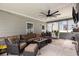 Relaxing covered patio area features comfortable seating and a ceiling fan at 436 Cotton Grass Dr., Loris, SC 29569