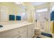 Bathroom featuring a walk-in tub, vanity with white cabinets, and a large mirror at 44 Hamby Dr., Pawleys Island, SC 29585