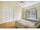 Cozy bedroom with two beds, hardwood floors, and a double door closet at 44 Hamby Dr., Pawleys Island, SC 29585