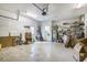 A large garage space features laundry, shelves for storage, and a door for convenient access at 44 Hamby Dr., Pawleys Island, SC 29585
