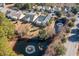 Aerial view of the home, showcasing the beautiful neighborhood and serene pond at 4608 Grovecrest Circle, North Myrtle Beach, SC 29582