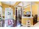 Open concept home featuring a grand foyer with hardwood floors and elegant dining area at 4608 Grovecrest Circle, North Myrtle Beach, SC 29582