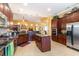 Traditional kitchen boasts granite counters, stainless appliances, and a functional island at 4608 Grovecrest Circle, North Myrtle Beach, SC 29582