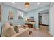Cozy living area featuring bright walls, comfortable seating, a TV, and ample natural light at 476 Lakeshore Dr., Pawleys Island, SC 29585