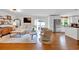 Cozy living room with hardwood floors, neutral furniture, and sliding glass doors at 476 Lakeshore Dr., Pawleys Island, SC 29585