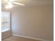 Bedroom featuring a light-filled space with hardwood floors, a window, and neutral walls at 4949 Southgate Pkwy., Myrtle Beach, SC 29579